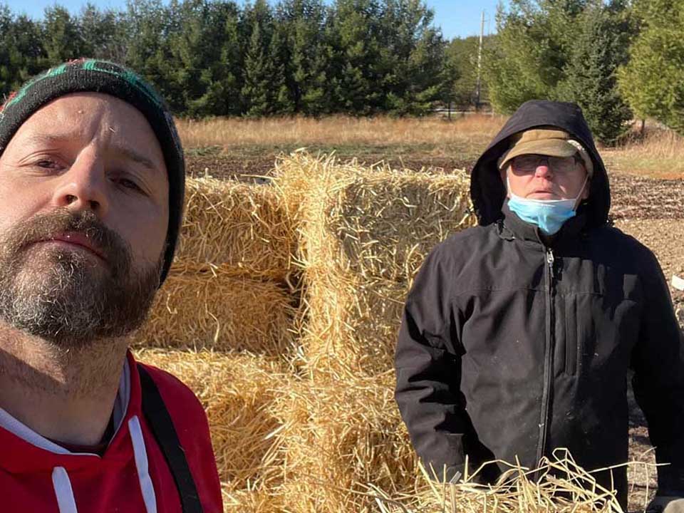 Jason & Larry Covering Strawberries